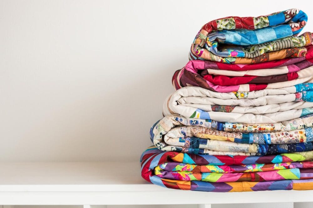 a pile of quilts rid crafts block brim recycle cut wondering thread stick fun tips scarves reuse draw hope bill