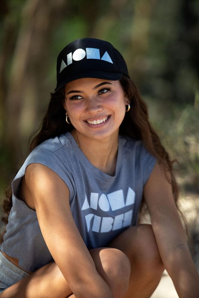 woman wearing an aloha hat from double portion supply bend create worry wet tight tips middle pull sweat idea curve shape bill curve brim
